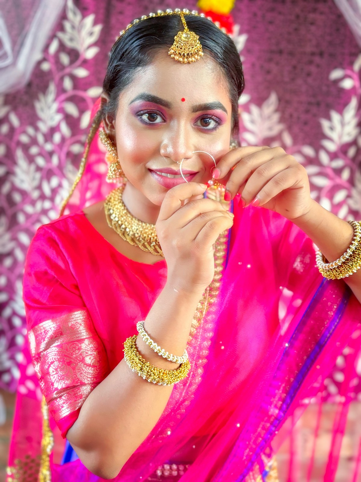 Close-up of bridal jewelry and bangles